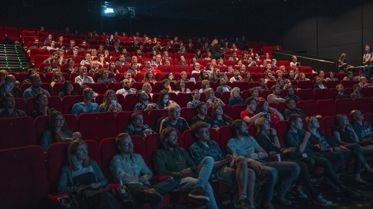 Movie theater seats and screen — how film distribution works theatrical digital streaming