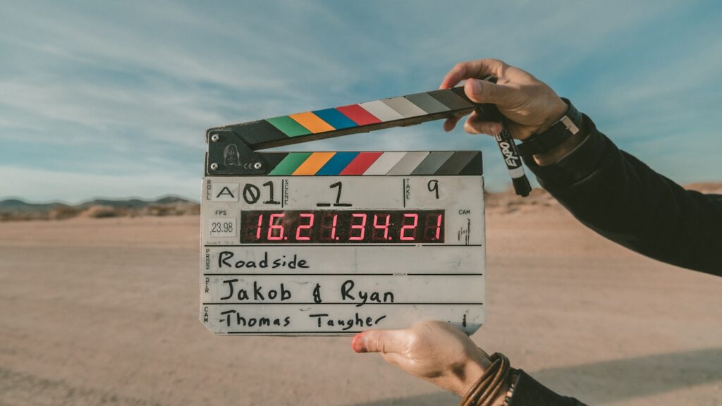 Independent filmmaker behind camera — indie film distribution guide