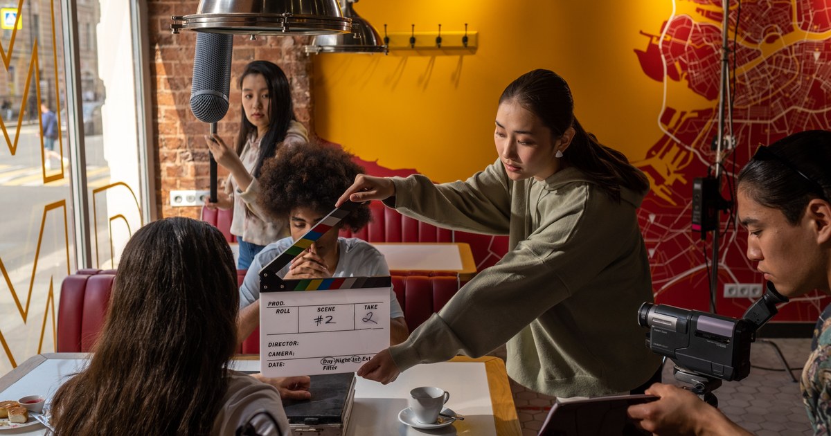 BET+ Is Now Part of Paramount+: What This Means for 2026 1 Film production crew setting up a scene with a clapperboard, representing content acquisition now routed through Paramount+'s BET Hub